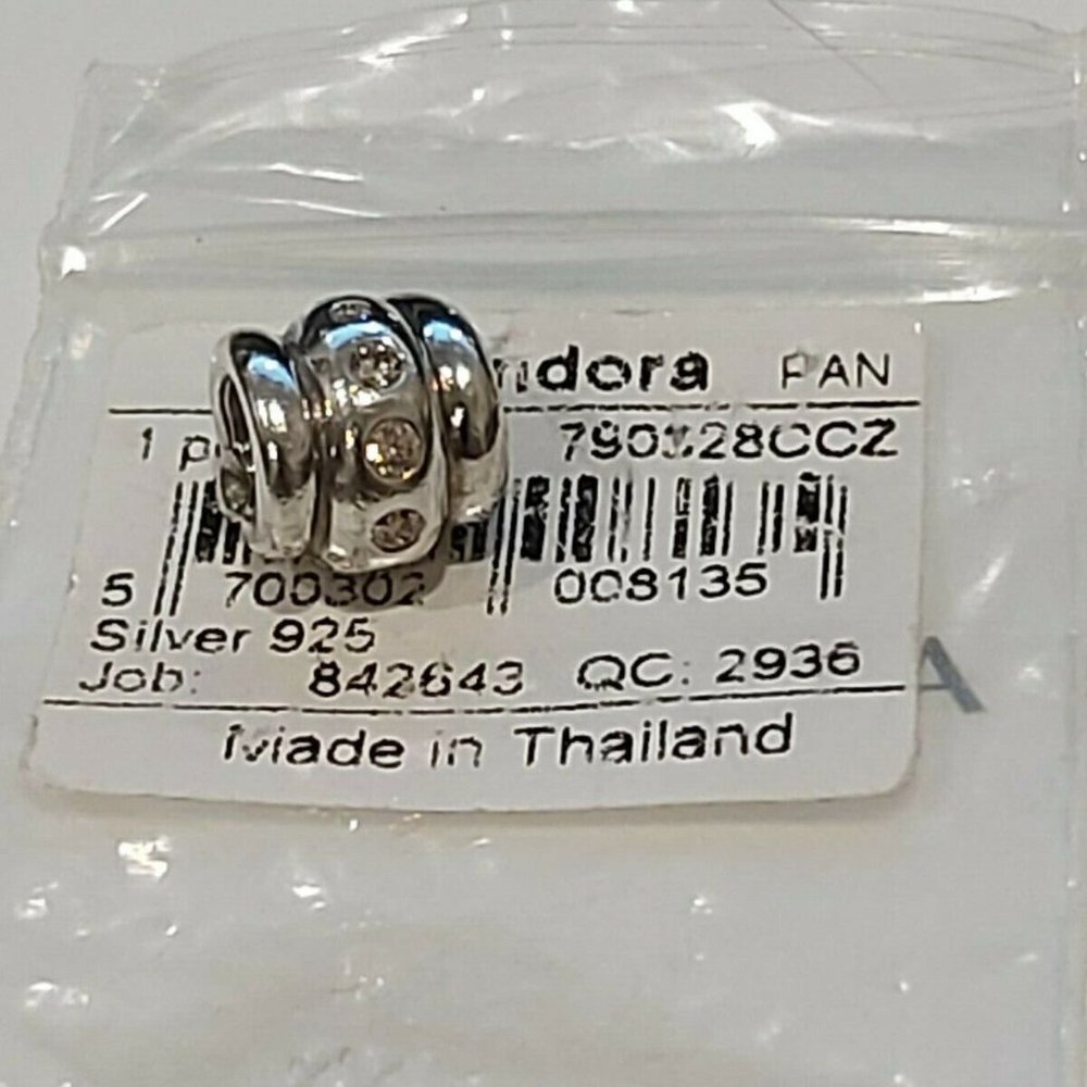 Authentic PANDORA Sterling Silver *RETIRED* Love Knot Champagne CZ  790328CCZ